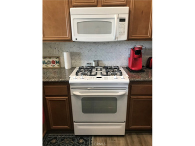 GATED COMMUNITY! CLUBHOUSE AMENITIES! 55+ LIVING!  This lovely