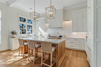 This nearly one-acre marsh-front property in Windmill Harbour