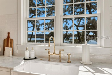 This nearly one-acre marsh-front property in Windmill Harbour