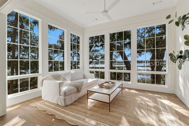 This nearly one-acre marsh-front property in Windmill Harbour