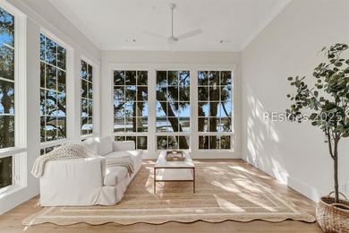 This nearly one-acre marsh-front property in Windmill Harbour