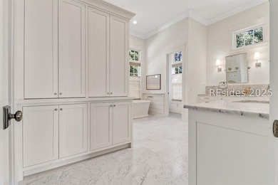 This nearly one-acre marsh-front property in Windmill Harbour