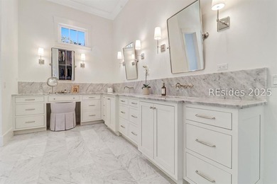 This nearly one-acre marsh-front property in Windmill Harbour