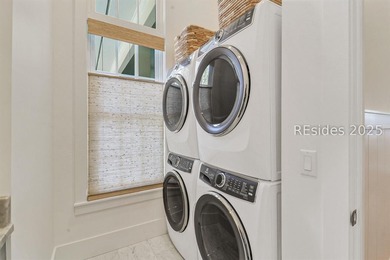 This nearly one-acre marsh-front property in Windmill Harbour