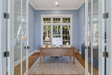 This nearly one-acre marsh-front property in Windmill Harbour