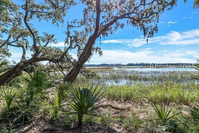 This nearly one-acre marsh-front property in Windmill Harbour