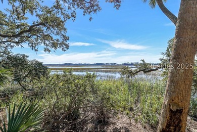 This nearly one-acre marsh-front property in Windmill Harbour