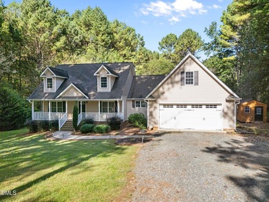 Welcome home to this charming Cape Cod style home on 1.84 acres!