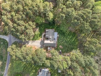 Welcome home to this charming Cape Cod style home on 1.84 acres!