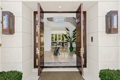 Welcome to an exquisite Palm Beach estate built in 2017