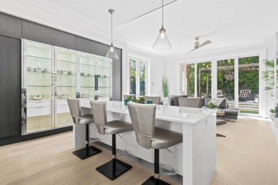 Welcome to an exquisite Palm Beach estate built in 2017