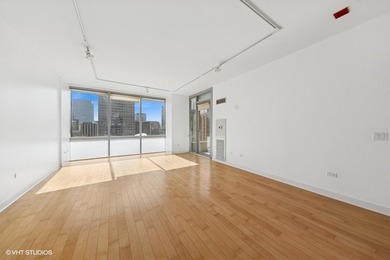 This freshly painted, high-floor 1-bedroom residence offers