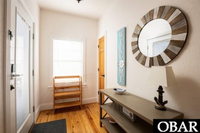 Welcome to coastal living at its finest! This SPACIOUS END UNIT