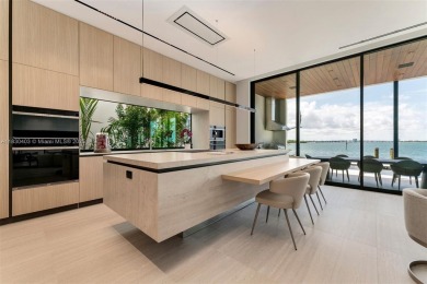 Experience luxury living in this extraordinary waterfront home