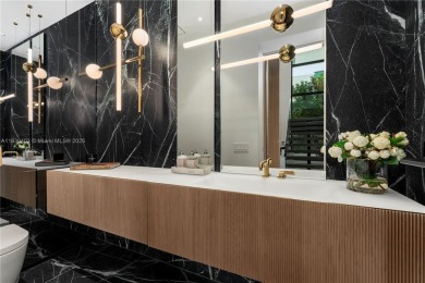 Experience luxury living in this extraordinary waterfront home