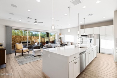 Private Elevator & $200K+ in Upgrades. Located in gated Pinnacle