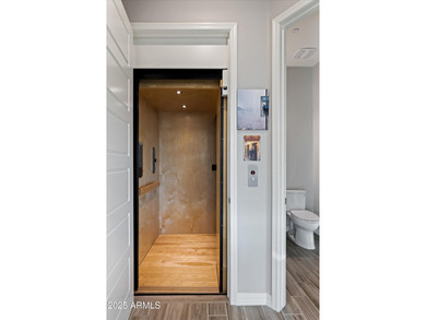Private Elevator & $200K+ in Upgrades. Located in gated Pinnacle