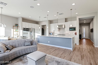 Private Elevator & $200K+ in Upgrades. Located in gated Pinnacle