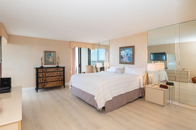 Enjoy a beach styled residence with wrap around views of