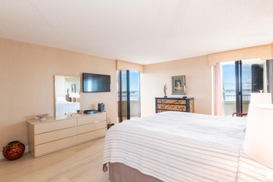 Enjoy a beach styled residence with wrap around views of