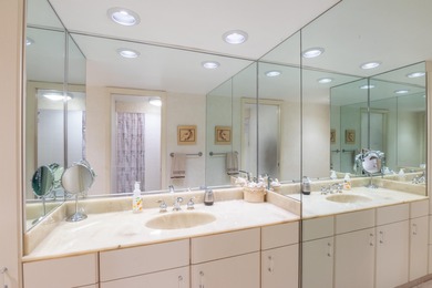 Enjoy a beach styled residence with wrap around views of