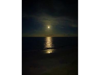 Enjoy a beach styled residence with wrap around views of