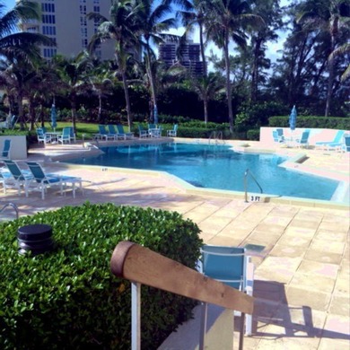 Enjoy a beach styled residence with wrap around views of