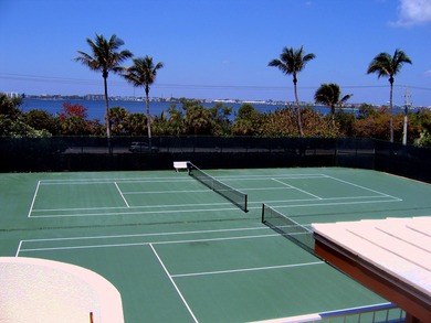 Enjoy a beach styled residence with wrap around views of