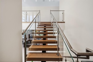 Custom, new construction, contemporary waterfront estate in the