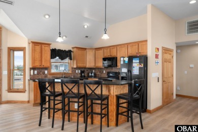 Located in the sought-after Village of Nags Head, this lovingly