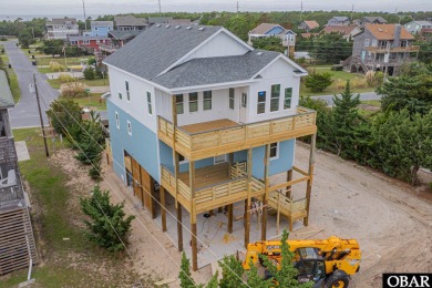 Welcome to this under-construction semi-oceanfront home, set for