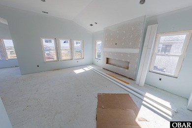Welcome to this under-construction semi-oceanfront home, set for