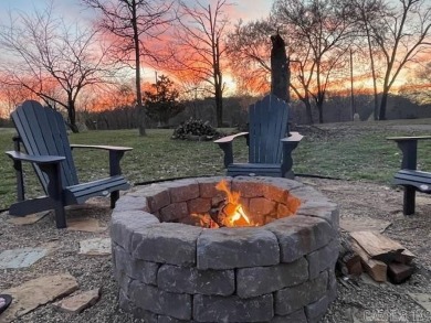 Nestled among the trees with stunning river views and direct