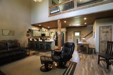 Nestled among the trees with stunning river views and direct