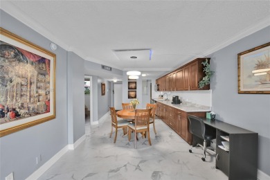 This Cross Fox Condominium unit is a tropical oasis in Fort