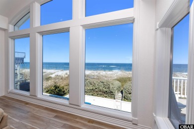 Exceptional oceanfront estate situated on half an acre with over