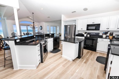 Exceptional oceanfront estate situated on half an acre with over