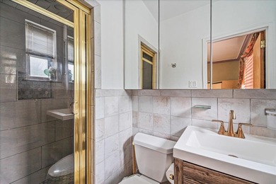 Welcome to this spacious three-bedroom, two-bathroom co-op