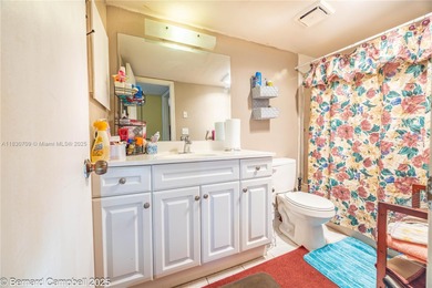 GATED COMMUNITY***First floor Corner Unit condo with lots of