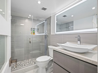 Step into paradise with this fully renovated 2 bedroom, 2 bath