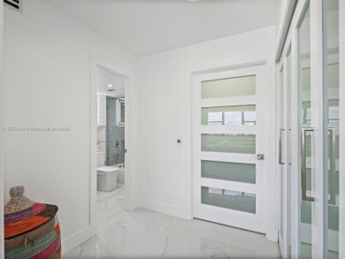 Step into paradise with this fully renovated 2 bedroom, 2 bath