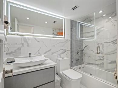 Step into paradise with this fully renovated 2 bedroom, 2 bath