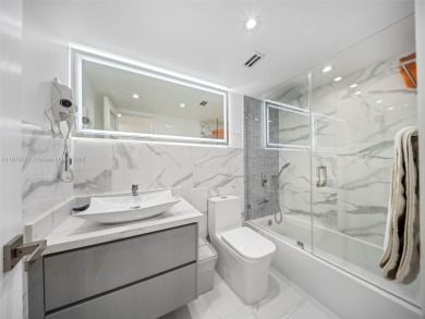 Step into paradise with this fully renovated 2 bedroom, 2 bath