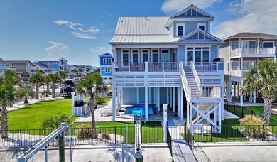 Coastal Luxury Canal-Front Beach House! Welcome to this stunning
