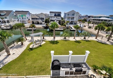 Coastal Luxury Canal-Front Beach House! Welcome to this stunning
