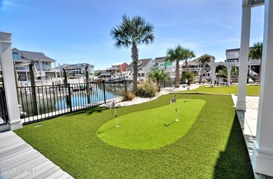 Coastal Luxury Canal-Front Beach House! Welcome to this stunning