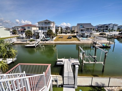 Coastal Luxury Canal-Front Beach House! Welcome to this stunning