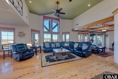 Experience coastal elegance at Savannah Dawn, a 7 BR