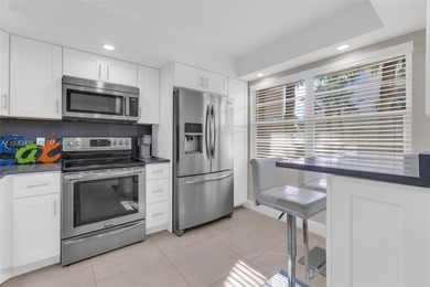 Discover this beautifully remodeled residence where elegance