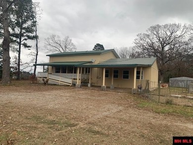 Great buy on a 2,000 sq ft home (3 bdrm/2 bath) fronting scenic